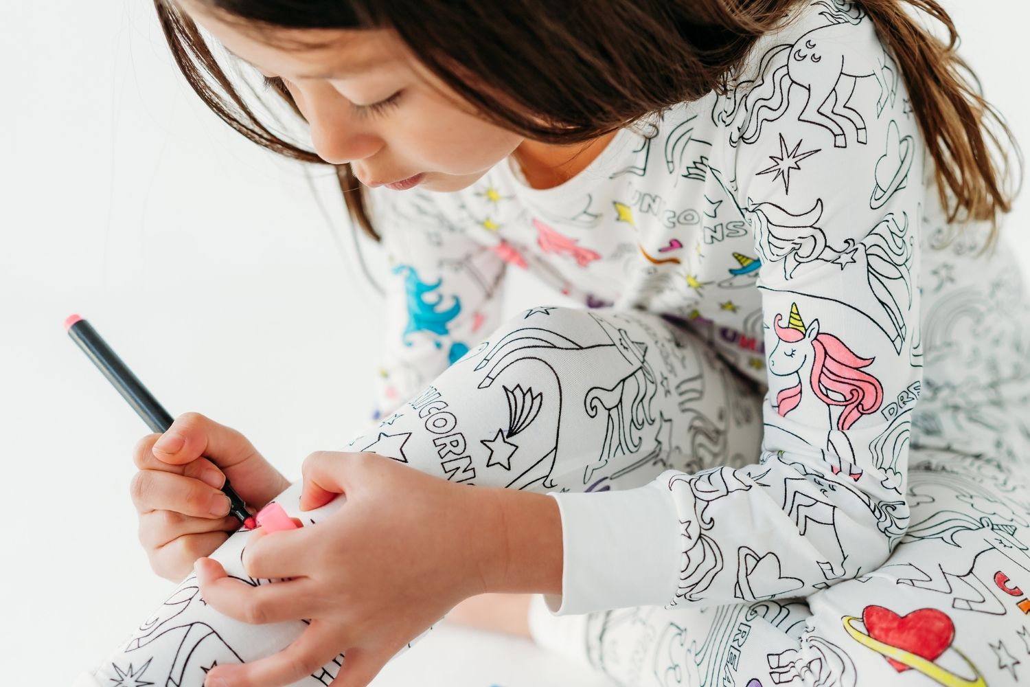 girl coloring unicorn coloring pajamas. creative gift for girls