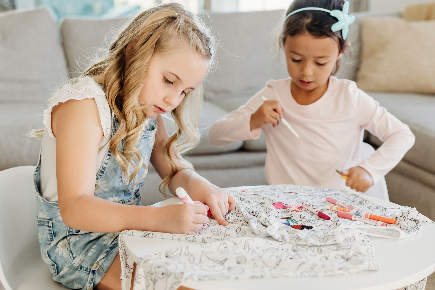 two girls coloring pajamas sleepover activity for kids